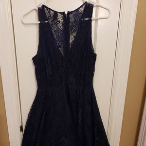 Navy lace blue mini dress with plunging neckline